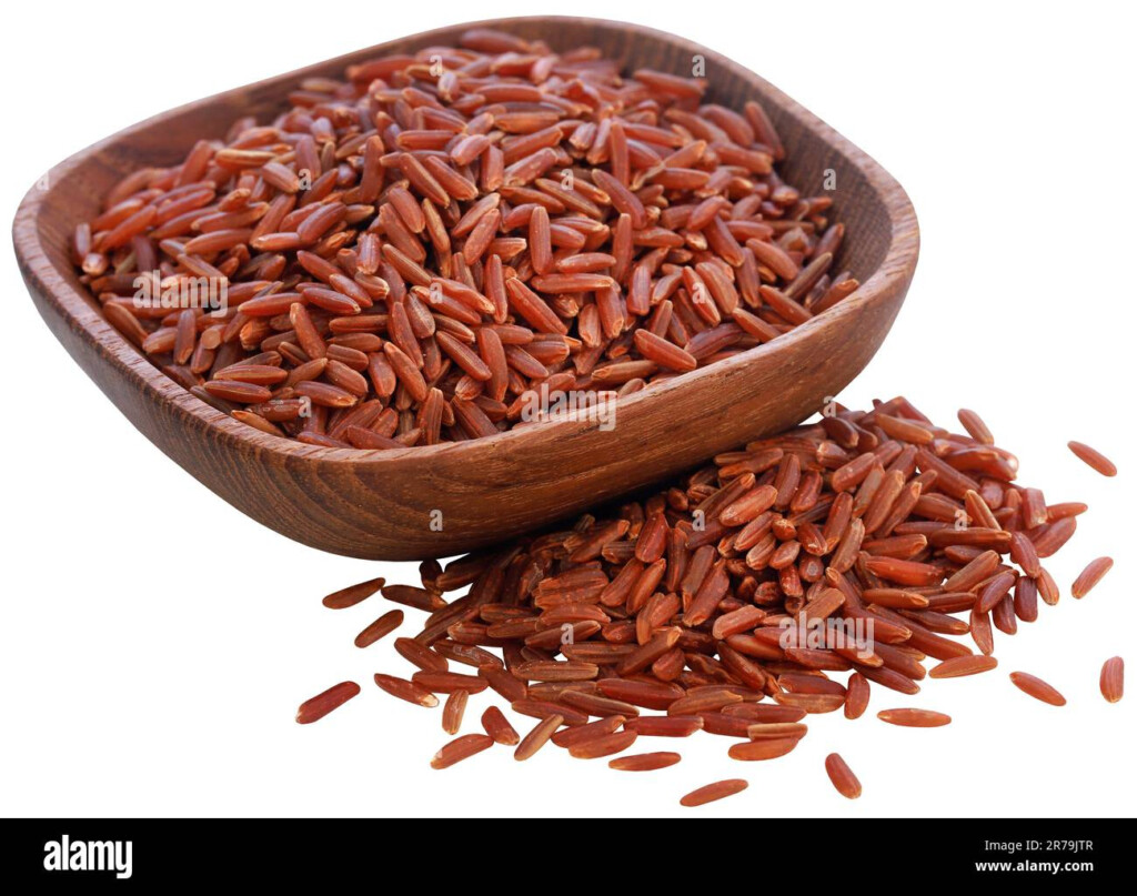 Red Jasmine Rice Full Of Nutritional Value In Wooden Bowl Stock Photo 